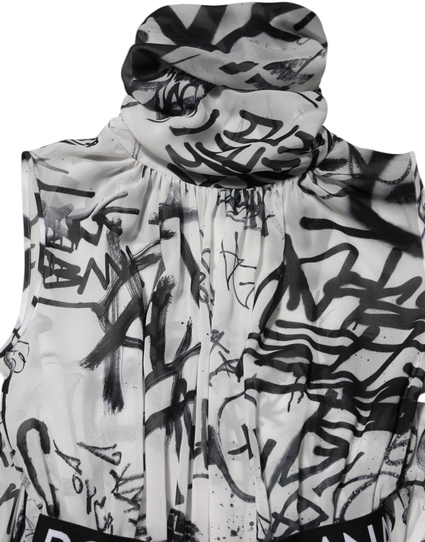 Dolce &amp; Gabbana – Langes, plissiertes Kleid mit Monogramm in Schwarz und Weiß