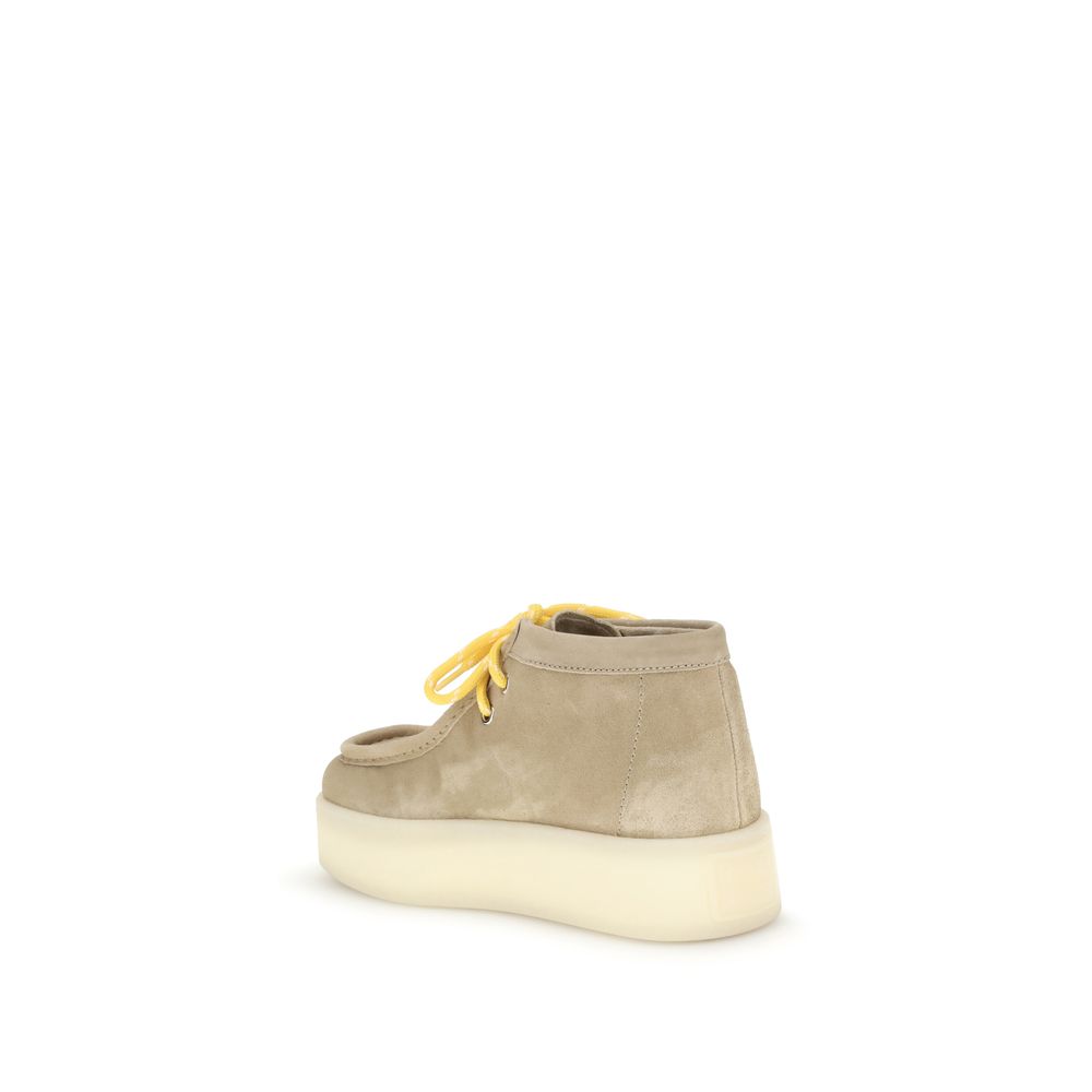 Miu Miu Plateau-Stiefeletten aus Leder