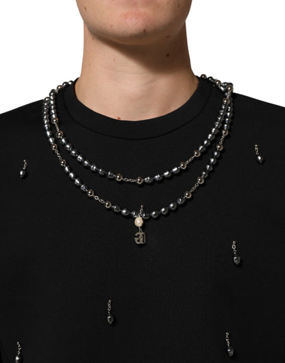 Dolce &amp; Gabbana Schwarzes Polyester-T-Shirt mit Halskettenverzierung