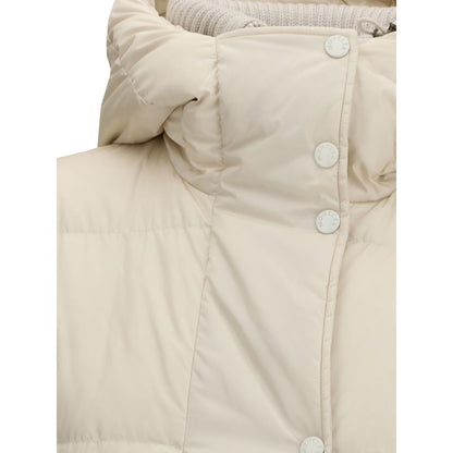 Moncler Die lange Daunenjacke mit Kapuze und Wollbesatz